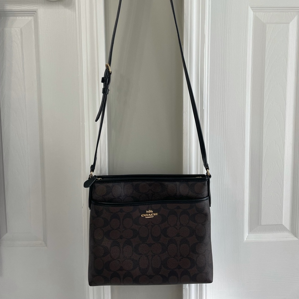 Coach crossbody and matching wrislet